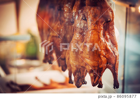 peking duck grilled in kitchen peking duck grilled in kitchen 86095877
