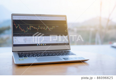 Cryptocurrency price chart on digital exchange on Laptop Cryptocurrency price chart on digital exchange on Laptop 86096625