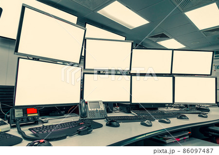 group of blank monitors and screen on security desk or control room for monitor process or stock data trading group of blank monitors and screen on security desk or control room for monitor process or stock data trading 86097487
