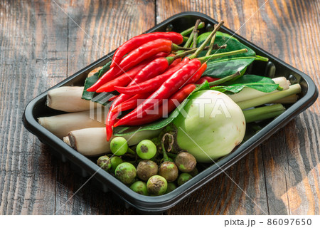 Tom kha ingredients set for Thai cooking in black pallet on wooden table 86097650