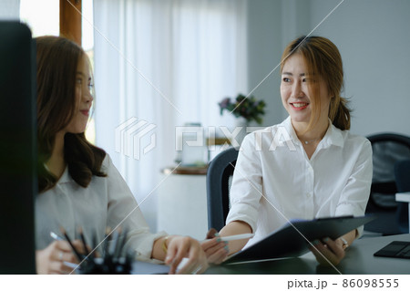 College students reading and studying and tutor together before final exam. 86098555