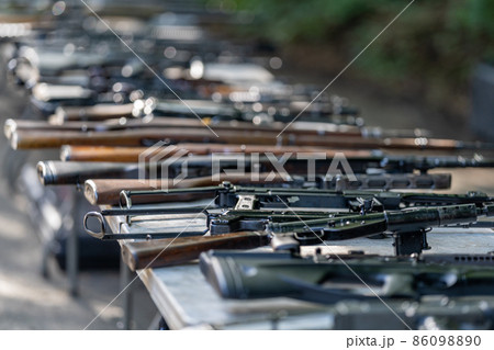 collection of historical and modern weapons on the shooting range collection of historical and modern weapons on the shooting range 86098890
