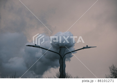 Air pollution, closeup of one smoking pipe BW 86101271