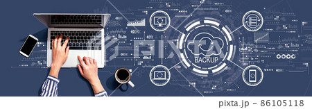 Backup concept with person using laptop Backup concept with person using laptop 86105118