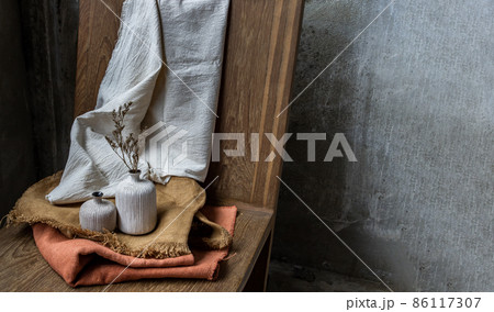 Handmade Double ceramic Vases on wooden chair. Handmade Double ceramic Vases on wooden chair. 86117307