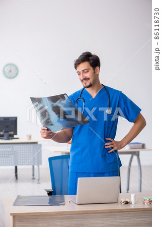 Young male doctor radiologist working in the clinic 86118730