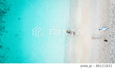 Coral island, koh He, beach and boats in Phuket province, Thailand Coral island, koh He, beach and boats in Phuket province, Thailand 86121832