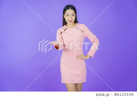 Portrait beautiful young asian woman smile with action Portrait beautiful young asian woman smile with action 86123336
