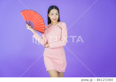 Portrait beautiful young asian woman with fan 86123360