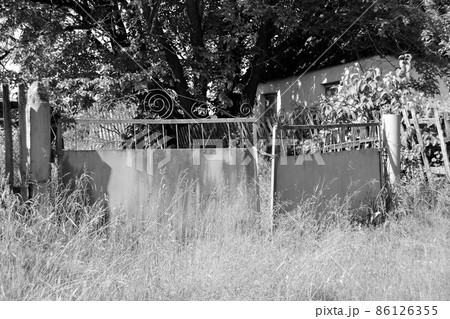 Beautiful old gate from abandoned house in village Beautiful old gate from abandoned house in village 86126355