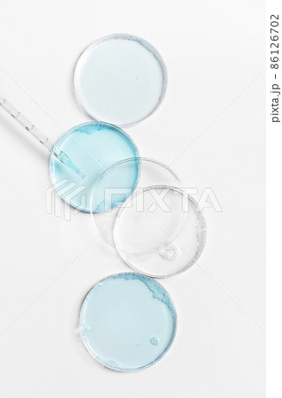 Abstract petri dishes with cosmetic on white background top view. Science cosmetic laboratory concept. Abstract petri dishes with cosmetic on white background top view. Science cosmetic laboratory concept. 86126702