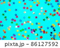 Multicolored stars on a blue paper background. Festive background. 86127592
