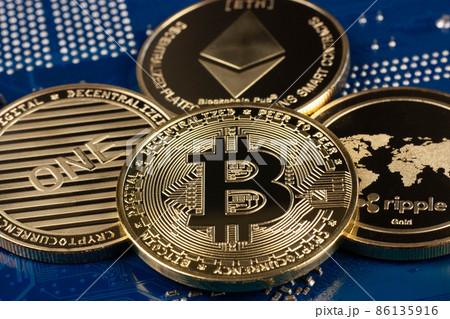 Bitcoin coin symbol on blue electronic circuit board background. Close-up, blue background. Business, money, cryptocurrency concept. Bitcoin coin symbol on blue electronic circuit board background. Close-up, blue background. Business, money, cryptocurrency concept. 86135916