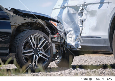 Cars crashed heavily in road accident after collision on city street. Road safety and insurance concept 86141325