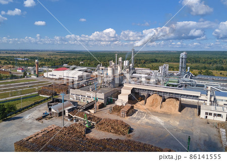 Aerial view of factory with high plant manufacture structure. Global production and manufacturing concept. Aerial view of factory with high plant manufacture structure. Global production and manufacturing concept. 86141555