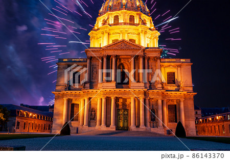 Celebratory colorful fireworks over the Les Invalides (The National Residence of the Invalids) at night. Paris, France Celebratory colorful fireworks over the Les Invalides (The National Residence of the Invalids) at night. Paris, France 86143370