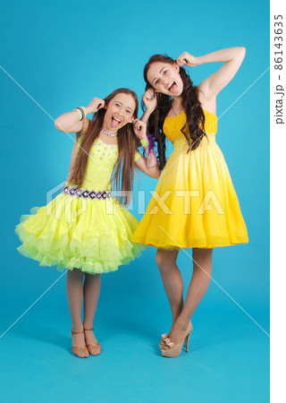 Two young girls in ballroom dress Two young girls in ballroom dress 86143635
