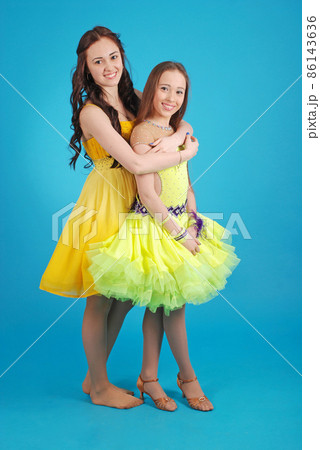 Two young girls in ballroom dress 86143636