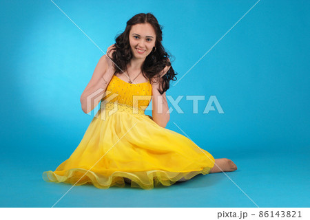 Young girl in ballroom dress 86143821