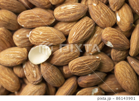 Selective focus.Macro shooting of dry Almond Nuts.Vegetarian food rich in minerals and vitamins. Selective focus.Macro shooting of dry Almond Nuts.Vegetarian food rich in minerals and vitamins. 86143901
