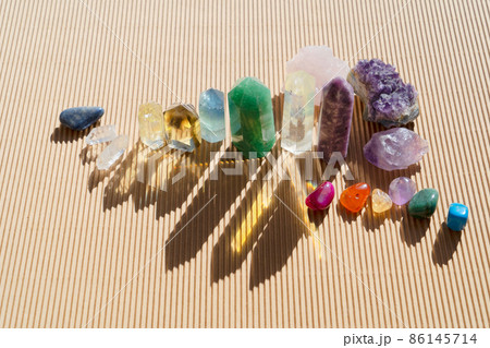 Healing crystals on brown background 86145714