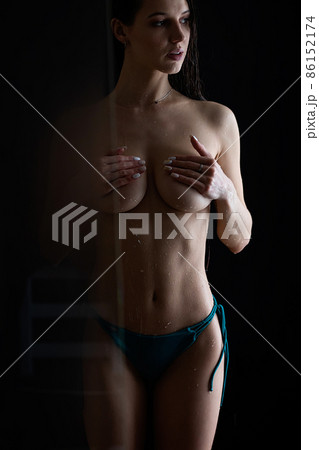 Crop sensual woman covering naked breast 86152174