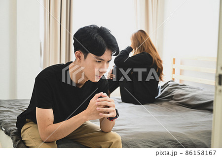 Unhappy young couple with relationship problem. Family problems concept. Unhappy young couple with relationship problem. Family problems concept. 86158167