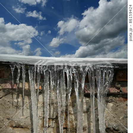 Photo of icicles. Natural light in a sunny day Photo of icicles. Natural light in a sunny day 86159424