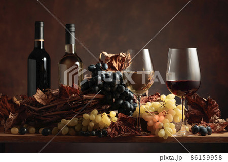 White and red wine with bunches of grapes. White and red wine with bunches of grapes. 86159958