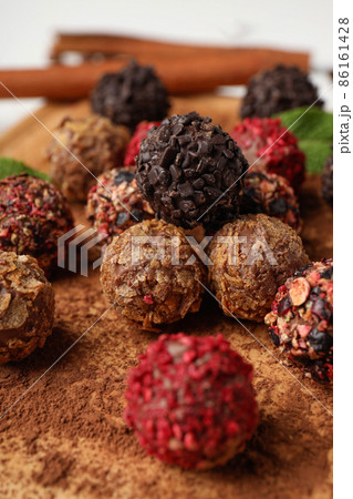 Concept of sweets with chocolate candies, close up Concept of sweets with chocolate candies, close up 86161428