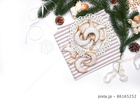 Traditional German or Austrian Vanillekipferl vanilla kipferl cookies and Chistmas decorations 86165252