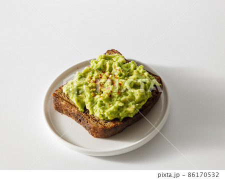 Avocado toast on whole grain sandwich bread 86170532