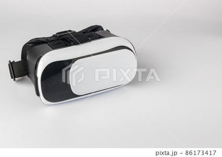 Virtual reality helmet on white background. 86173417