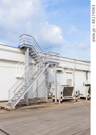 Steel railing roof stairs. Metal staircase to the roof of a modern building. 86174063