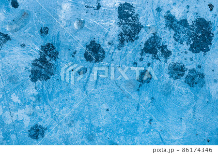 Black paint spots on old scratched metallic grunge texture steel dirty blue iron background 86174346