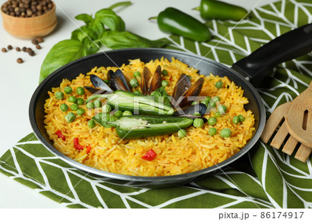 Concept of delicious food with Spanish Paella Concept of delicious food with Spanish Paella 86174917