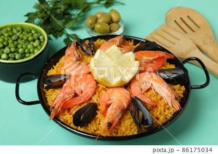 Concept of delicious food with Spanish Paella Concept of delicious food with Spanish Paella 86175034