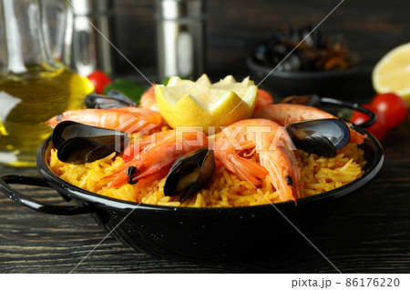 Concept of delicious food with Spanish Paella Concept of delicious food with Spanish Paella 86176220