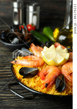 Concept of delicious food with Spanish Paella Concept of delicious food with Spanish Paella 86176221