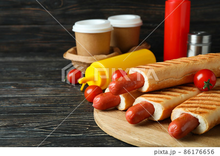 Concept of tasty food with french hot dog Concept of tasty food with french hot dog 86176656