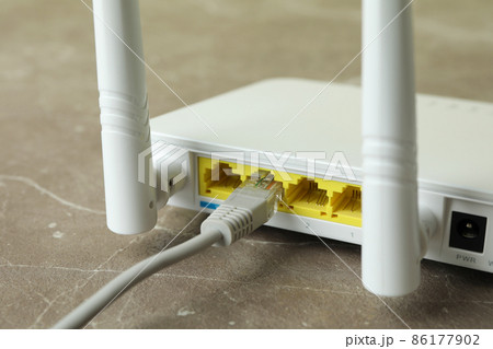 Wi-Fi router with external antennas on gray textured table 86177902
