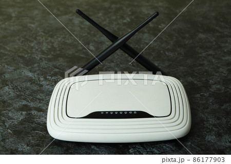 Wi-Fi router with external antennas on black smokey background 86177903
