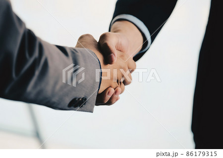 Close up of Business people shaking hands, finishing up meeting,  86179315