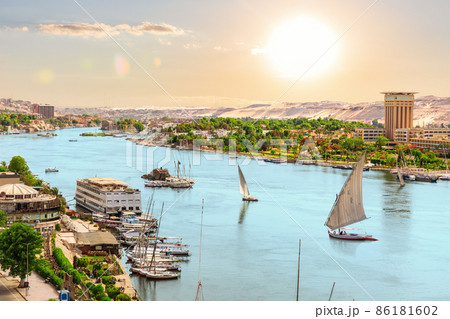 The Nile river, boats and views of Aswan city, Egypt The Nile river, boats and views of Aswan city, Egypt 86181602