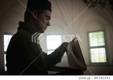 Portrait of a man in a medieval costume. Portrait of a man in a medieval costume. 86182291