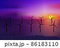 Wind turbines, ecological power generators, standing in the water. Beautiful mauve sea sunset. 86183110