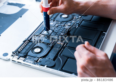 Computer diagnostics. Maintenance repair engineer support. Pc technician service with laptop on hardware background. Electronic technology development concept. Computer diagnostics. Maintenance repair engineer support. Pc technician service with laptop on hardware background. Electronic technology development concept. 86183486
