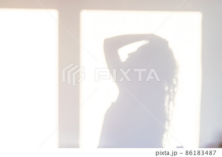 Space shadow. Sunlight architecture abstract background with light, black shadow overlay from window on white texture wall. Organic drop diagonal shadow for Decorative and backdrop. 86183487