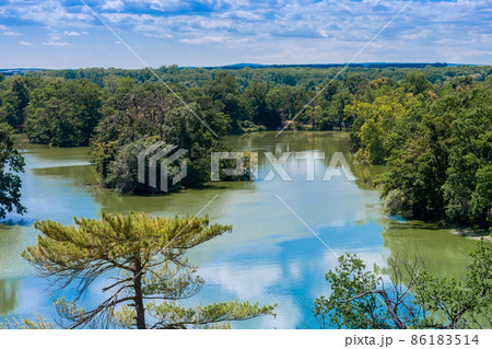 Lednice-Valtice complex, view from Minaret-observation tower for castle pond and park with trees. 86183514