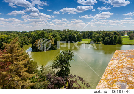 Lednice-Valtice complex, view from Minaret-observation tower for castle pond , park with trees and castle Lednice 86183540